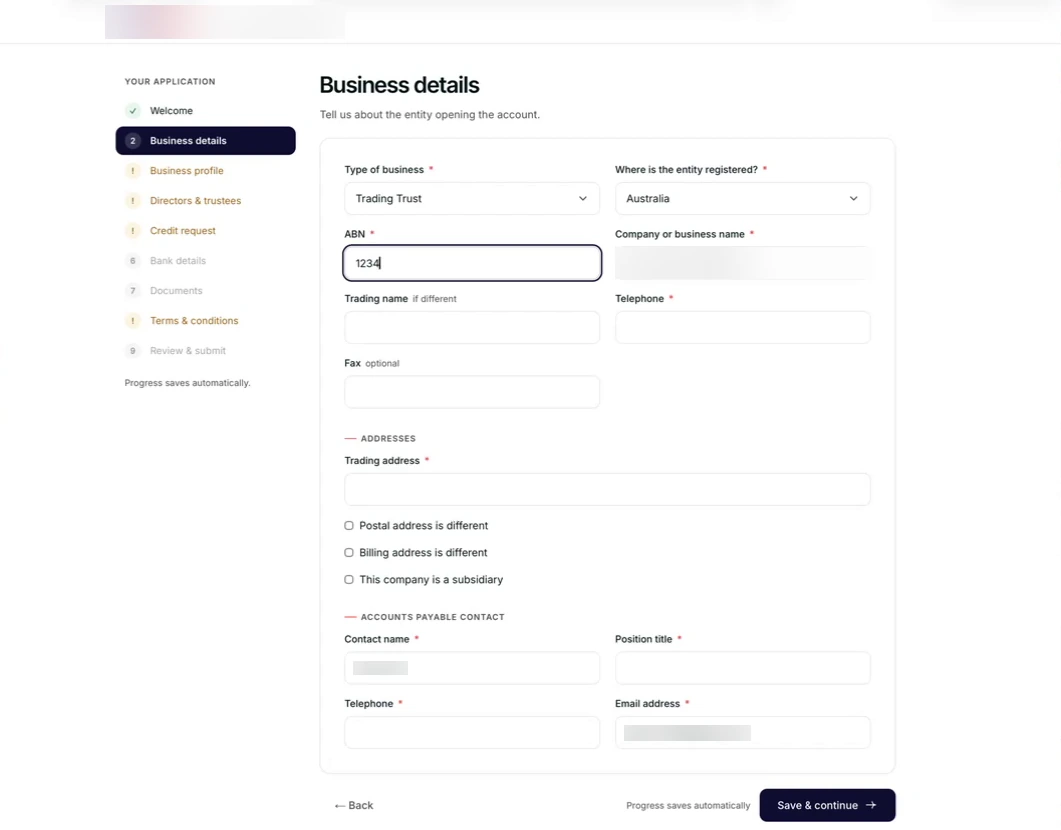 The client's application on the Business details step. A nine-step list on the left runs from Welcome to Review and submit. The form asks for the type of business, where the entity is registered, the ABN, company name, trading name, phone, trading address and an accounts payable contact, and notes that progress saves automatically.