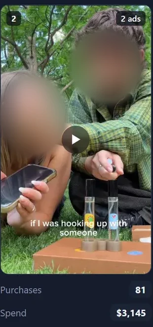 Rank 2 on the purchases board. A video still of two people on a lawn with the product, badged 2 ads, with 81 purchases on $3,145 of spend.